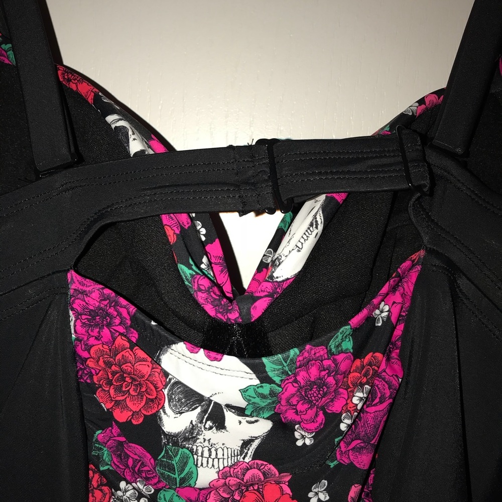 Spandex/Polyster one piece skull bathing suit.